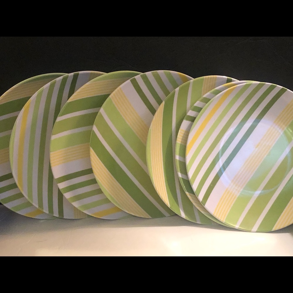 Retro melamine snack plates in mod, groovy colors. Set of 7 in good condition